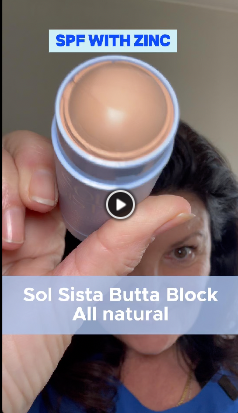 Holding a sunscreen zinc stick